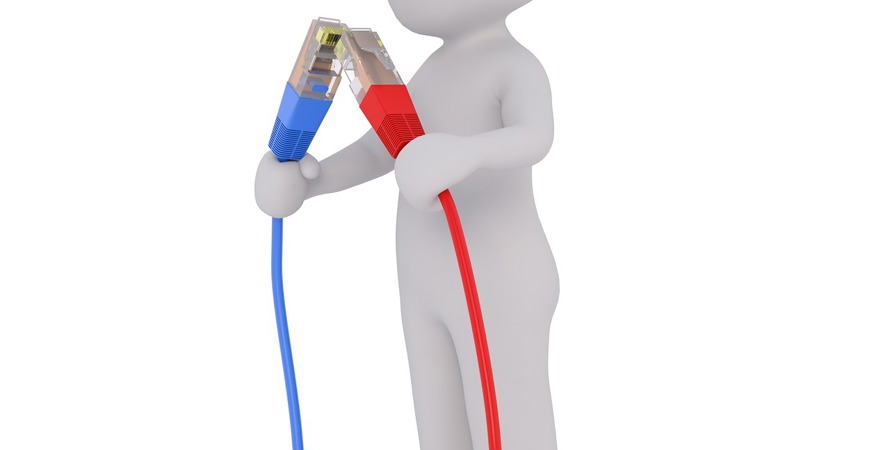 En figur som håller i två kablar